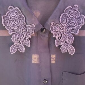 Sleeveless Shear Tank with Floral Collar.